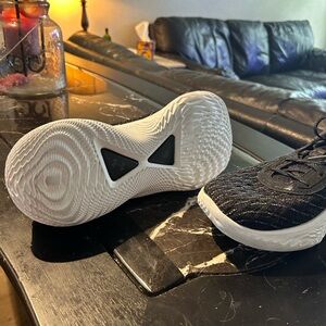 Curry Flow team basketball shoe size 11.5 men. Only court use - barely used